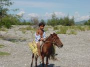 Boy on pony at Manatuto